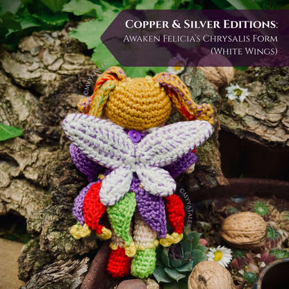 Back view of whimsical crochet fairy wings, Chrysalis form with white wings, Amigurumi wing attachment tutorial.